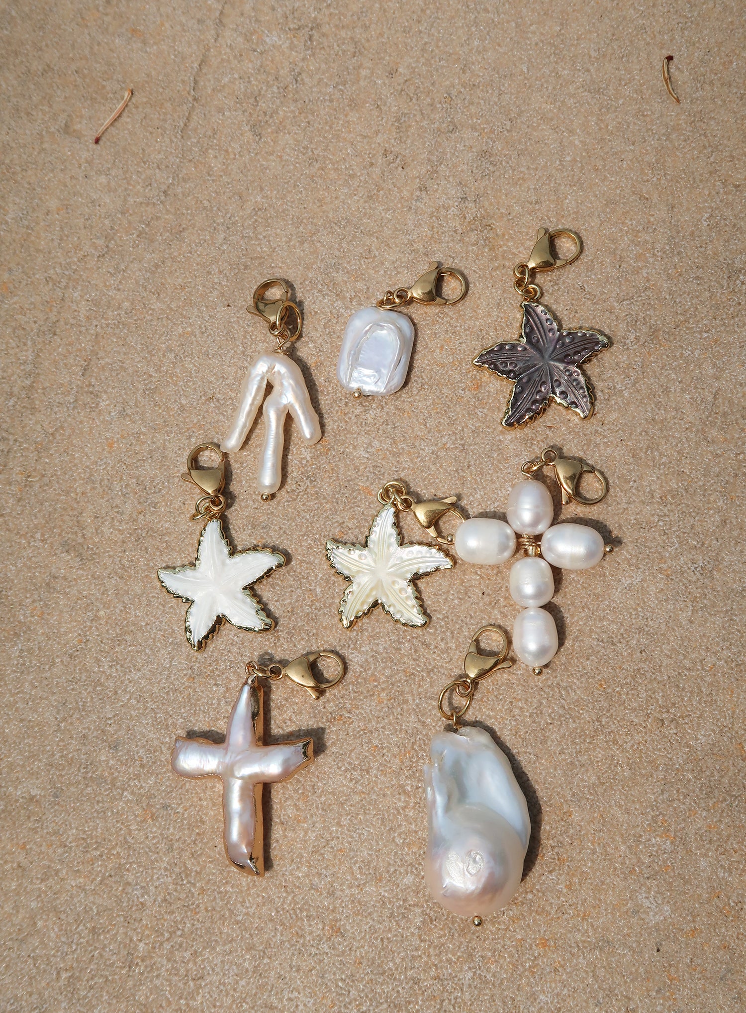 Cross pearl pendant